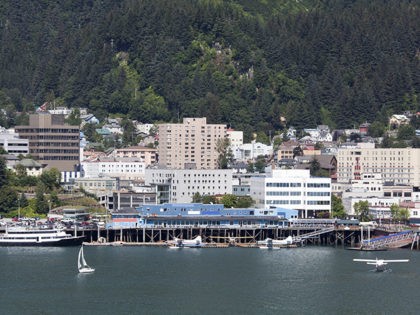 The view of water transportation and Juneau downtown skyline (Alaska).