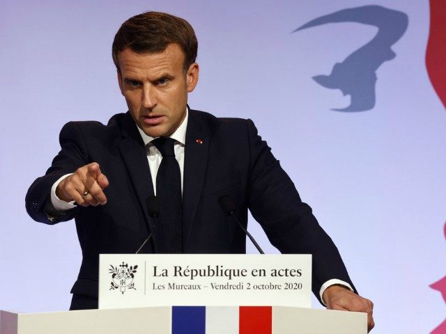 French President Emmanuel Macron delivers a speech to present his strategy to fight separatism, Friday Oct. 2, 2020 in Les Mureaux, outside Paris. President Emmanuel Macron, trying to rid France of what authorities say is a "parallel society" of radical Muslims thriving outside the values of the nation, is laying …