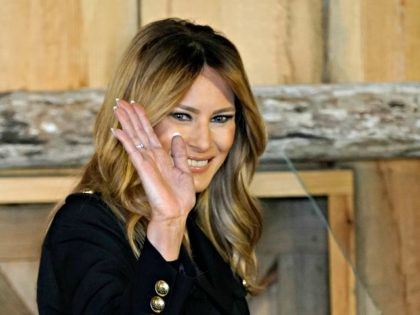 First lady Melania Trump waves after speaking at a campaign event, Saturday, Oct. 31, 2020, in West Bend, Wis. (AP Photo/Morry Gash)