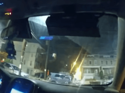 Police body-cam video shows the moment of impact as Karon Hylton is struck by a civilian SUV. (Video Screenshot/DC Police)