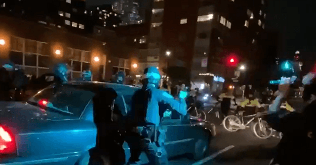 Watch: Car Drives Into Line Of NYPD Cops During Protest, At Least One ...