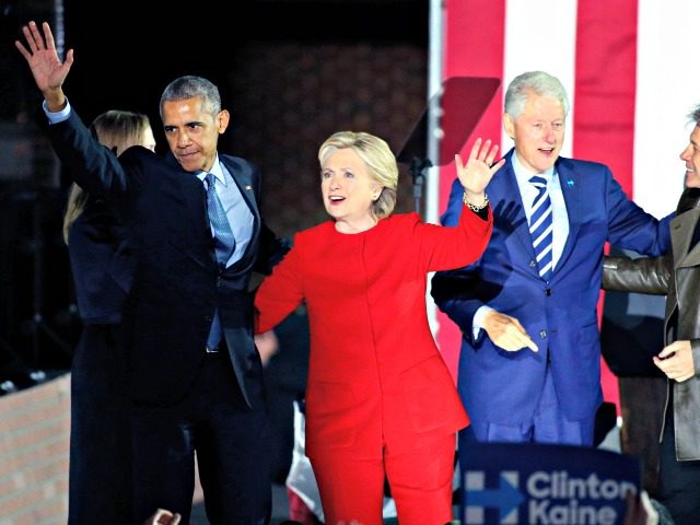 US Democratic presidential nominee Hillary Clinton (C) stands on stage with US President Barack Obama (L), former US president Bill Clinton (2nd-R) and singer Jon Bon Jovi (R) during a rally on the final night of the 2016 US presidential campaign at Independence Mall in Philadelphia, Pennsylvania, November 07, 2016 …