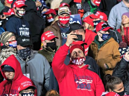 Supporters of US President Donald Trump attend a Make America Great Again rally as he campaigns at Erie International Airport in Erie, Pennsylvania, October 20, 2020. (Photo by SAUL LOEB / AFP) (Photo by SAUL LOEB/AFP via Getty Images)