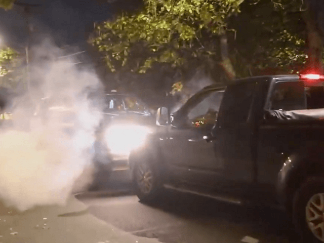 Shots were fired after a SUV and an Antifa Pickup truck stand off in the middle of a Vanco