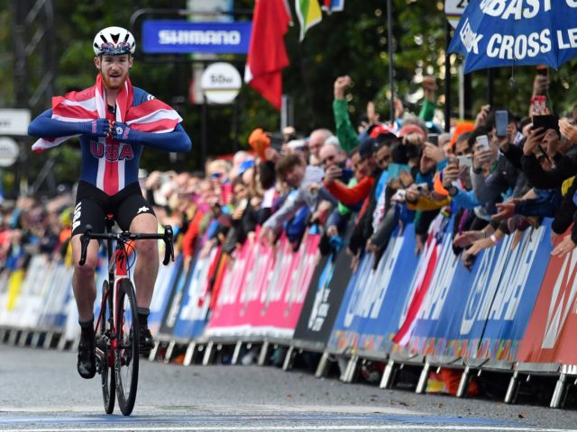 Gold medallist USA's Quinn Simmons reacts after winning in the Men Junior Road Race at the