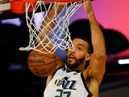 LAKE BUENA VISTA, FLORIDA - AUGUST 25: Rudy Gobert #27 of the Utah Jazz dunks the ball against the Denver Nuggets during the first quarter in Game Five of the Western Conference First Round during the 2020 NBA Playoffs at The Field House at ESPN Wide World Of Sports Complex …