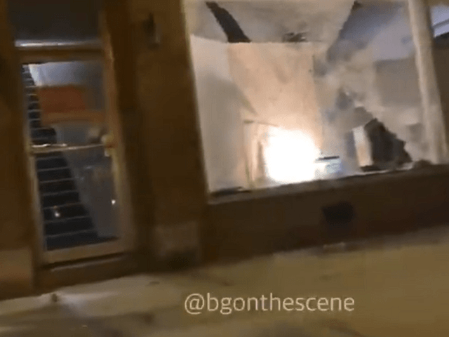 Proesters began smashing windows in Wisconsin. (Twitter Video Screenshot/Brendan Gutenschw