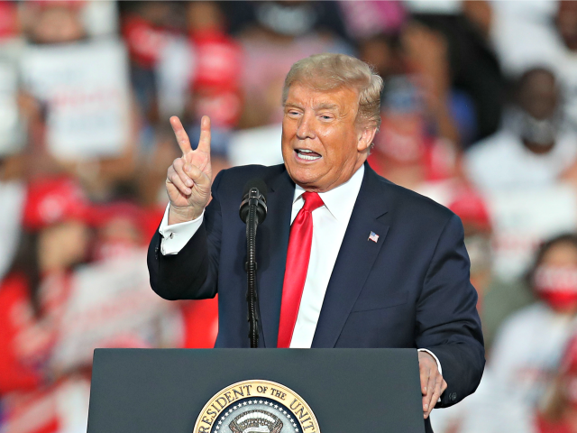 SANFORD, FLORIDA - OCTOBER 12: President Donald Trump speaks during his campaign event at the Orlando Sanford International Airport on October 12, 2020 in Sanford, Florida. Trump was holding his first campaign rally since his coronavirus diagnosis as he continues to campaign against Democratic presidential candidate Joe Biden. (Photo by …