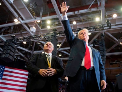 US President Donald Trump alongside radio talk show host Rush Limbaugh arrive at a Make Am