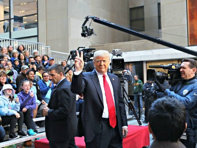 NEW YORK, NY - APRIL 21: Republican presidential candidate Donald Trump waves while appearing at an NBC Town Hall at the Today Show on April 21, 2016 in New York City. The GOP front runner appeared with his wife and family and took questions from audience members. (Photo by Spencer …
