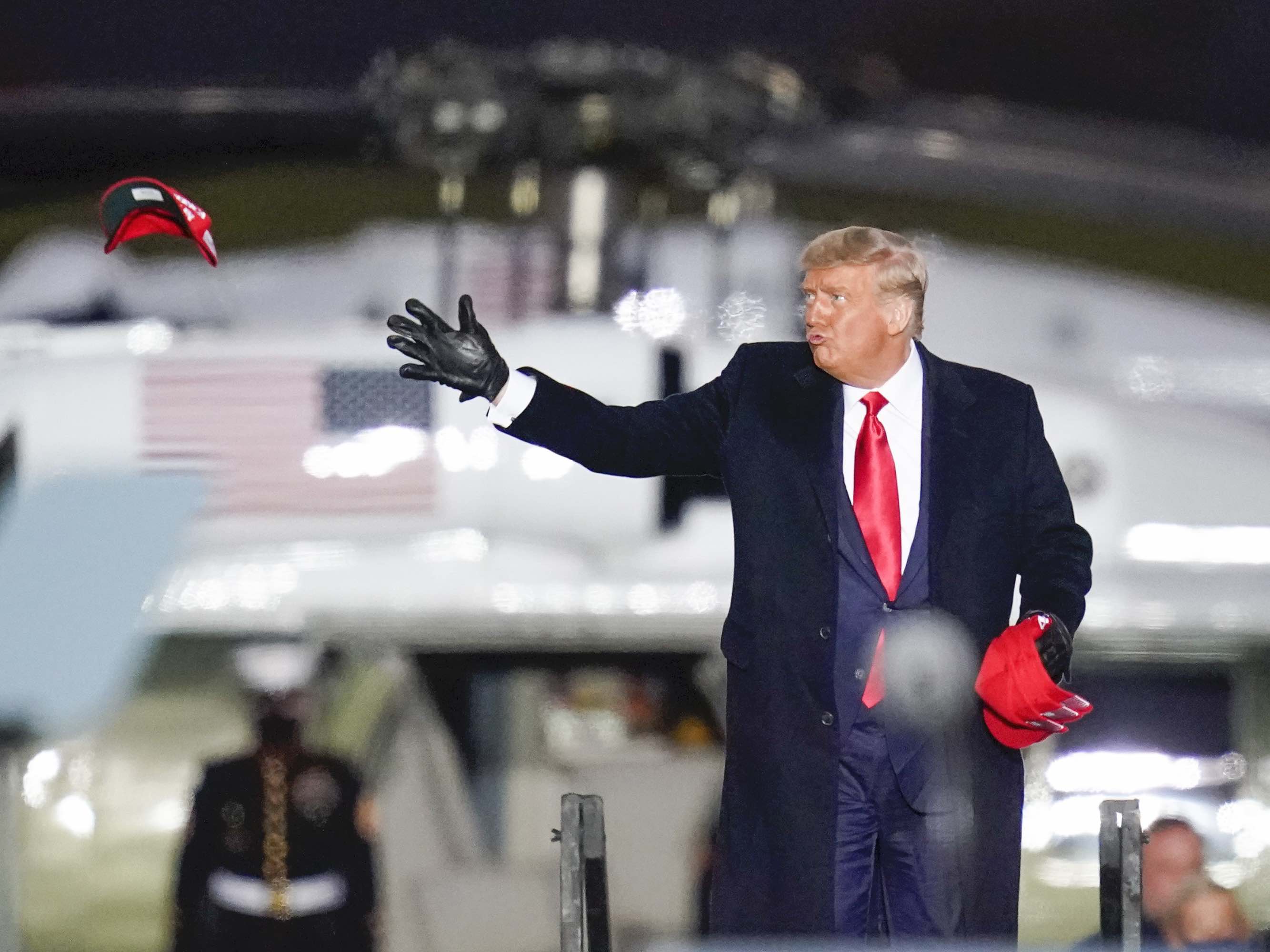 Trump throws hat Pennsylvania (Keith Srakocic / Associated Press)