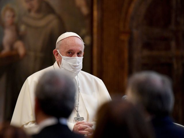Pope Francis wearing a protective face mask, attends an inter-religious prayer service for peace along with other religious representatives in the Basilica of Santa Maria in Aracoeli, a church on top of Rome's Capitoline Hill, on October 20, 2020 in Rome. (Photo by Andreas SOLARO / AFP) (Photo by ANDREAS …
