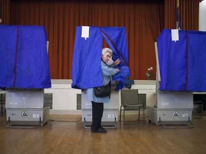 PHILADELPHIA, PA - APRIL 24: Lilyan Maitan stands in a voting booth during the Republican primary election April 24, 2012 at St. George Greek Orthodox Church in Philadelphia, Pennsylvania. Turnout is expected to be low as Former Massachusetts Gov. Mitt Romney continues his campaign as the presumptive GOP candidate. (Photo …