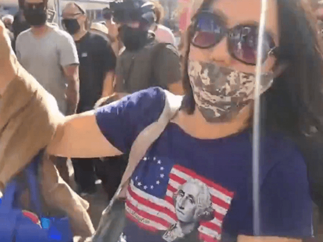 Woman attacked by mob in San Francisco near Free Speech protest. (Video Screenshot/Kitty S