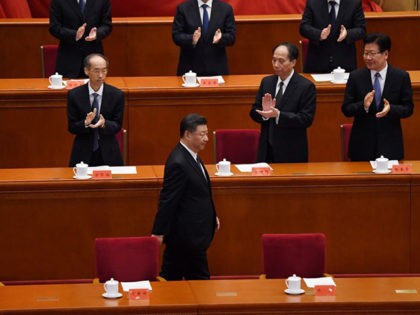 TOPSHOT - Chinese President Xi Jinping is applauded as he arrives for a ceremony marking the 70th anniversary of China's entry into the Korean War, in Beijing's Great Hall of the People on October 23, 2020. (Photo by NOEL CELIS / AFP) (Photo by NOEL CELIS/AFP via Getty Images)