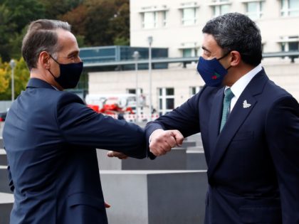 UAE Foreign Minister Sheikh Abdullah bin Zayed al-Nahyan greets German Foreign Minister Heiko Maas as they visit the Holocaust memorial prior to their historic meeting with the Israeli Foreign Minister in Berlin, on October 6, 2020. (Photo by MICHELE TANTUSSI / POOL / AFP) (Photo by MICHELE TANTUSSI/POOL/AFP via Getty …