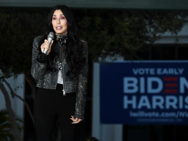 LAS VEGAS, NEVADA - OCTOBER 24: Singer/actress Cher campaigns for Joe Biden and Kamala Harris at an early vote rally at a residential shopping center on October 24, 2020 in Las Vegas, Nevada. In-person early voting for the general election in the battleground state began on October 17 and continues …