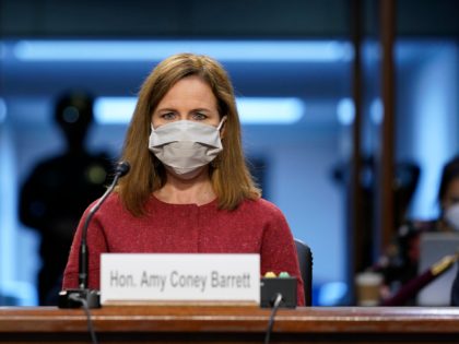 WASHINGTON, DC - OCTOBER 13: Supreme Court nominee Judge Amy Coney Barrett attends the second day of her Supreme Court confirmation hearing before the Senate Judiciary Committee on Capitol Hill on October 13, 2020 in Washington, DC. With less than a month until the presidential election, President Donald Trump tapped …