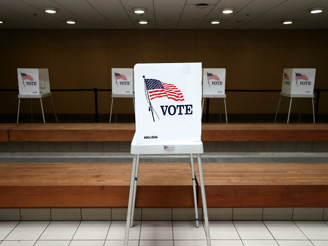 SAN JOSE, CALIFORNIA - OCTOBER 13: A view of voting booths at the Santa Clara County registrar of voters office on October 13, 2020 in San Jose, California. The Santa Clara County registrar of voters is preparing to take in and process thousands of ballots as early voting is underway …
