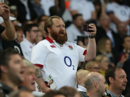 An England supporter sings the national anthem before the friendly rugby union Test match between England and Italy at St James Park in Newcastle on September 6, 2019. (Photo by Lindsey Parnaby / AFP) (Photo credit should read LINDSEY PARNABY/AFP via Getty Images)