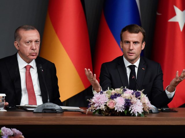 Turkish President Recep Tayyip Erdogan (L) and President Emmanuel Macron attend a conference as part of a summit called to attempt to find a lasting political solution to the civil war in Syria which has claimed in excess of 350 000 lives, at Vahdettin Mansion in Istanbul, on October 27, …