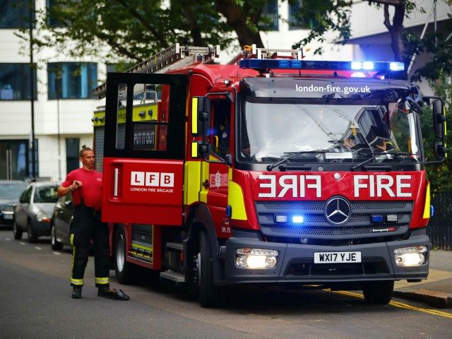 A fire engine parks outside Braithwaite House residential block in Islington in north London on June 24, 2017. Residents of 650 London flats were evacuated due to fire safety fears in the wake of the Grenfell Tower tragedy, but 83 people refused to leave their homes, according to local officials. …