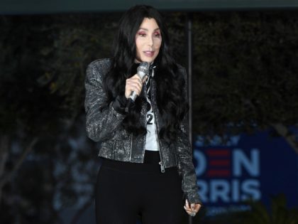 LAS VEGAS, NEVADA - OCTOBER 24: Singer/actress Cher campaigns for Joe Biden and Kamala Harris at an early vote rally at a residential shopping center on October 24, 2020 in Las Vegas, Nevada. In-person early voting for the general election in the battleground state began on October 17 and continues …
