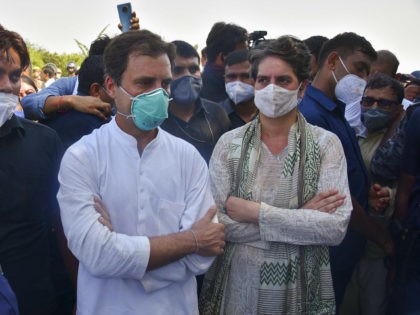 Indiaâ€™s opposition Congress party leaders, Rahul Gandhi, center and his sister Priyanka Gandhi stand after they are stopped by police on a highway in Gautam Buddha Nagar, Uttar Pradesh state, Thursday, Oct. 1, 2020. Indian police detained the leaders after preventing them from visiting a village where a 19-year-old woman …
