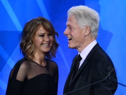 LOS ANGELES, CA - APRIL 20: Actress Jennifer Lawrence presents Former President of the United States Bill Clinton with the Advocate for Change Award onstage during the 24th Annual GLAAD Media Awards at JW Marriott Los Angeles at L.A. LIVE on April 20, 2013 in Los Angeles, California. (Photo by …