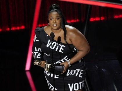 Lizzo accepts the award for top song sales artist at the Billboard Music Awards on Wednesd