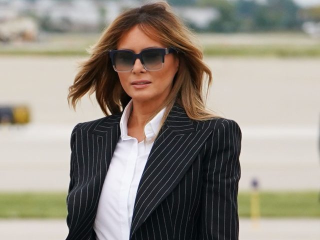 US President Donald Trump and First Lady Melania Trump step off Air Force One upon arrival