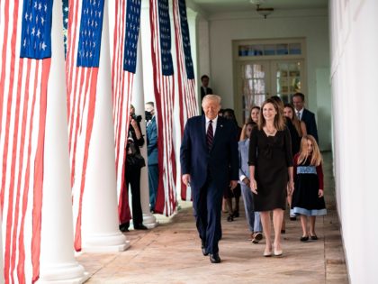 President Donald J. Trump walks with Judge Amy Coney Barrett, his nominee for Associate Ju