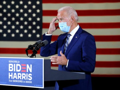 PEMBROKE PINES, FLORIDA - OCTOBER 13: Wearing a face mask to reduce the risk posed by the coronavirus, Democratic presidential nominee Joe Biden delivers remarks about his ‘vision for older Americans’ at Southwest Focal Point Community Center October 13, 2020 in Pembroke Pines, Florida. With three weeks until Election Day, …