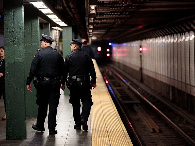 NEW YORK, NY - NOVEMBER 7: Members of the New York City Police patrol a subway station in Times Square, November 7, 2016 in New York City. With both presidential candidates holding their election night events in New York City, the NYPD has stepped up security ahead of election day. …