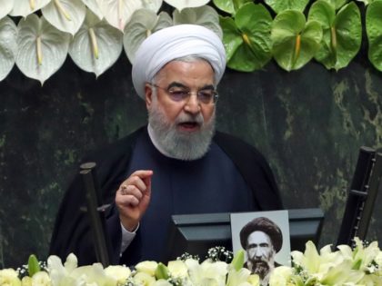 Iranian President Hassan Rouhani delivers a speech during the inaugural session of the new parliament following February elections, in Tehran on May 27, 2020. - The 11th legislature since the Islamic revolution of 1979 opened as the country's economy, which has been hard hit by the novel coronavirus, gradually returns …