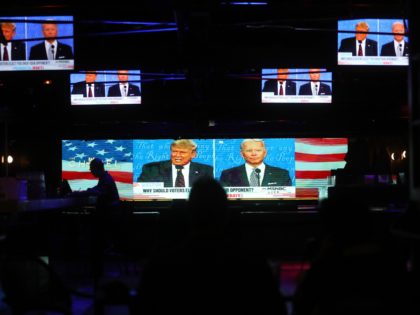 WEST HOLLYWOOD, CALIFORNIA - SEPTEMBER 29: A broadcast of the first debate between President Donald Trump and Democratic presidential nominee Joe Biden is played on indoor TV's at The Abbey, which seated patrons at socially distanced outdoor tables, on September 29, 2020 in West Hollywood, California. The debate being held …