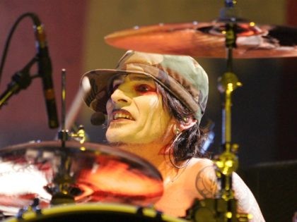 NEW YORK - MARCH 3: Drummer Tommy Lee of Motley Crue performs live at Madison Square Garden on March 3, 2005 in New York City. (Photo by Peter Kramer/Getty Images)