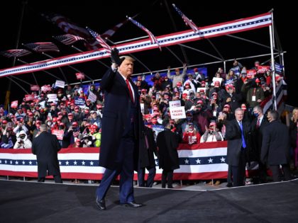 US President Donald Trump waves as he departs a rally at Williamsport Regional Airport in Montoursville, Pennsylvania on October 31, 2020. (Photo by MANDEL NGAN / AFP) (Photo by MANDEL NGAN/AFP via Getty Images)