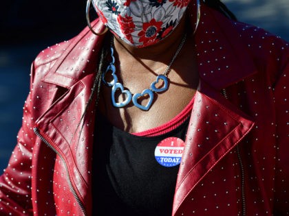 PHILADELPHIA, PA - OCTOBER 17: A woman wears a an "I VOTED TODAY" sticker after casting he