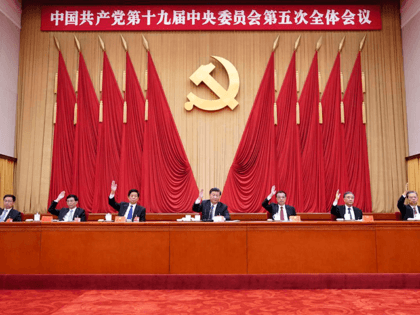 In this photo released by Xinhua News Agency, Chinese President Xi Jinping, also general secretary of the Communist Party of China (CPC) Central Committee, leads other Chinese leaders attending the fifth plenary session of the 19th Central Committee of the Communist Party of China (CPC) in Beijing, China on Oct. …