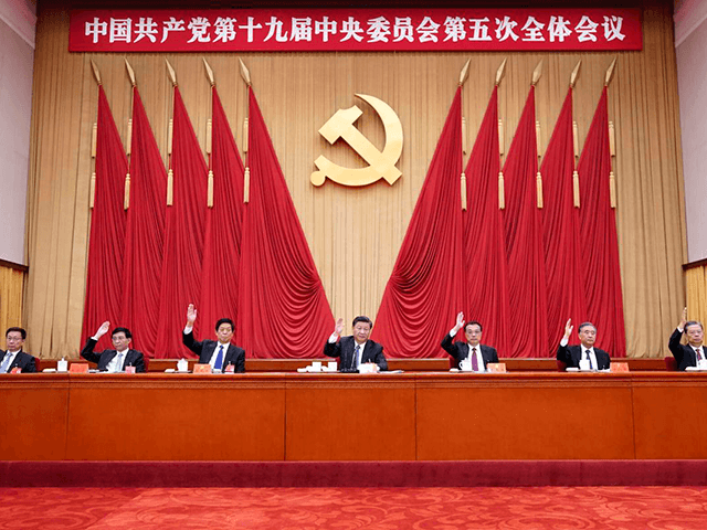 In this photo released by Xinhua News Agency, Chinese President Xi Jinping, also general secretary of the Communist Party of China (CPC) Central Committee, leads other Chinese leaders attending the fifth plenary session of the 19th Central Committee of the Communist Party of China (CPC) in Beijing, China on Oct. 29, 2020. China's leaders are vowing to make their country a self-reliant "technology power" after a meeting to draft a development blueprint for the state-dominated economy over the next five years. (Wang Ye/Xinhua via AP)