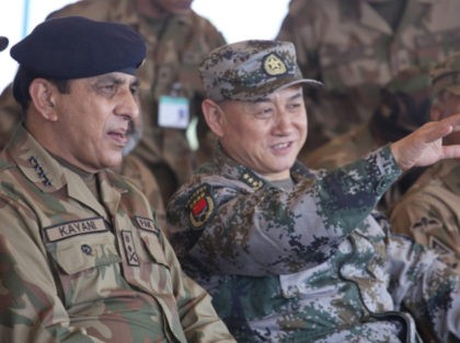 Pakistan army Chief Gen. Ashfaq Parvez Kayani, left, watches a joint exercise with General Hou Shusen, Deputy Chief of the People's Liberation Army, during in Jhelum, Pakistan Thursday, Nov 24, 2011. At the conclusion of the joint exercise, Kayani said that elements of East Turkestan Islamic Movement (ETIM) are operating …