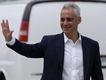 In this April 22, 2019 photo, Chicago Mayor Rahm Emanuel waves as he arrives at a news conference outside of the south air traffic control tower at O'Hare International Airport in Chicago. The south control tower has been awarded gold status by a group that monitors standards for eco-friendly buildings. …