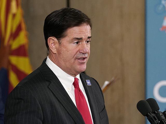 Arizona Gov. Doug Ducey speaks at a news conference with U.S. Census Director Steven Dilli