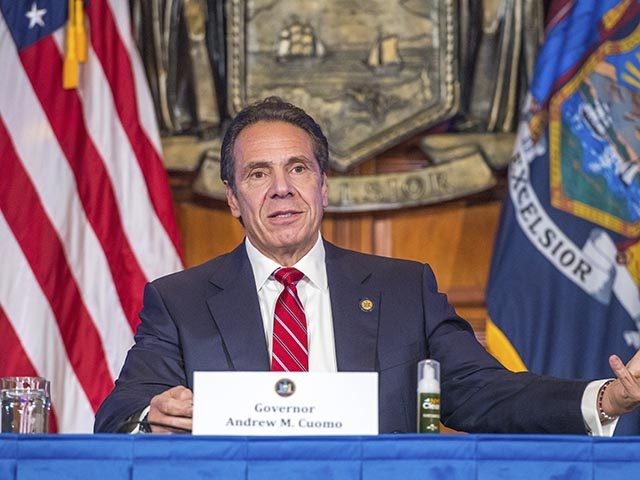 In this Wednesday, Nov. 18, 2020 photo provided by the Office of Governor Andrew M. Cuomo, Gov. Cuomo holds a press briefing on the coronavirus in the Red Room at the State Capitol in Albany, N.Y. During the news conference, Cuomo predicted a "tremendous spike" in COVID-19 cases after Thanksgiving …