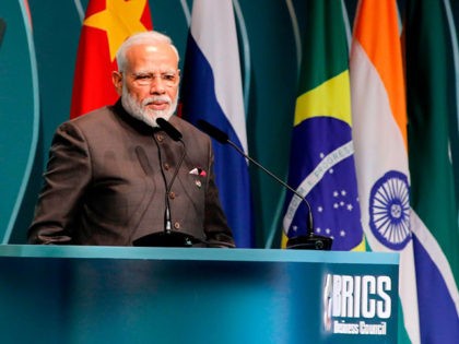 India's Prime Minister Narendra Modi speaks during the BRICS Business Council prior to the 11th edition of the BRICS Summit, in Brasilia, on November 13, 2019. - Bolsonaro walked a diplomatic tightrope, as he seeks to boost ties with Beijing and avoid upsetting key ally Donald Trump, on the eve …