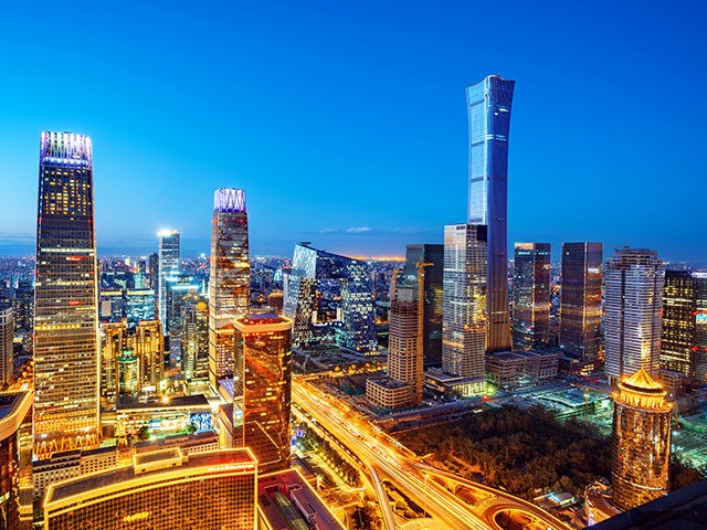 High-rise buildings and viaducts in the financial district of the city, night view of Beij