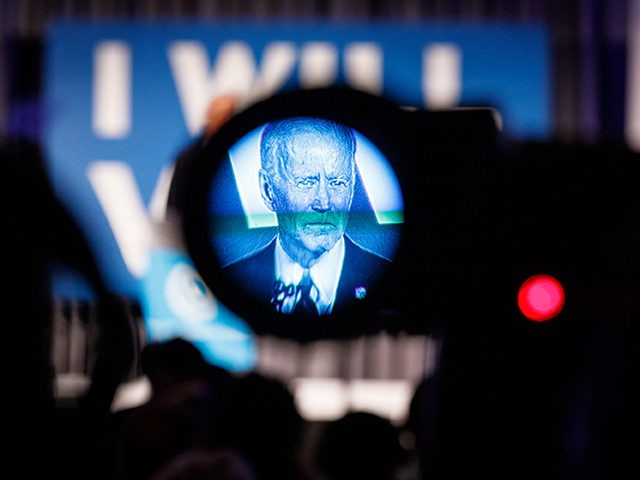 ATLANTA, GA - JUNE 06: Former vice president and 2020 Democratic presidential candidate Joe Biden, seen through a news camera viewfinder speaks to a crowd at a Democratic National Committee event at Flourish in Atlanta on June 6, 2019 in Atlanta, Georgia. The DNC held a gala to raise money …