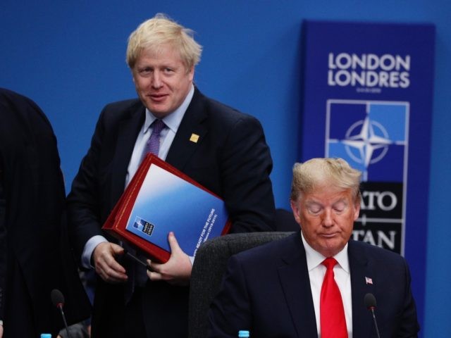 HERTFORD, ENGLAND - DECEMBER 04: UK Prime Minister Boris Johnson and U.S. President Donald Trump attend the NATO summit at the Grove Hotel on December 4, 2019 in Watford, England. France and the UK signed the Treaty of Dunkirk in 1947 in the aftermath of WW2 cementing a mutual alliance …