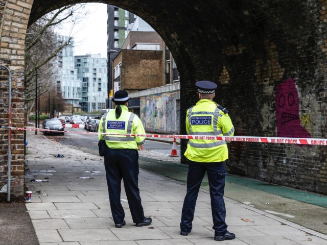 DEPTFORD, ENGLAND - DECEMBER 06: Police Officers guard a crime scene on December 6, 2019 in Deptford, England. Crosslom Davis, 20, known by the stage name Bis, was the second member of the drill group Harlem Spartans to be killed. Another member, Latwaan Griffiths, was stabbed to death in August …